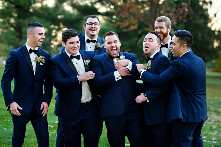 A Groom and his goomsmen horse around.